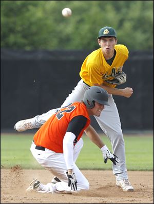 Clay's J.J. Miller forces out Ashland's Zach Bernhard but can't turn the double play.