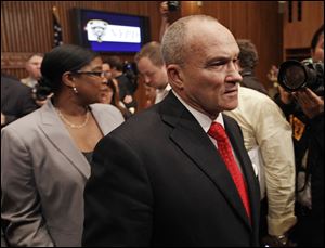 New York City police commissioner Raymond Kelly leaves a news conference in New York.