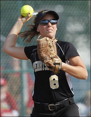 Perrysburg third baseman Mallory Creps makes a throw during the second inning against Elyria Thursday.