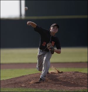 Dylan Dorfmeyer of Gibsonburg unleashes a pitch against Tinora after coming on in relief in the Golden Bears' regional semifinal loss to the Rams.