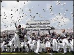  Cadets throw their hats in the air to conclude a graduation and commissioning ceremony at the U.S. Military Academy in West Point, N.Y.