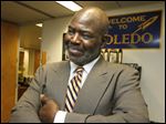  Mayor Mike Bell says a woman found in a house where a man died is not a relative.