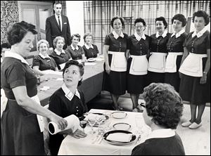 A training session for waitresses is provided to employees at the Commodore Perry in 1962. The Commodore Perry was considered one of the top downtown hotels.