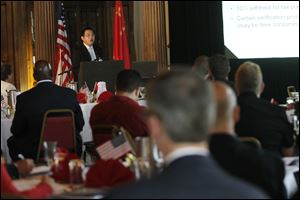 John Tang, attorney and head of the Shanghai-based China Practice Group of Brennan, Manna, & Diamond, Akron, speaking on 