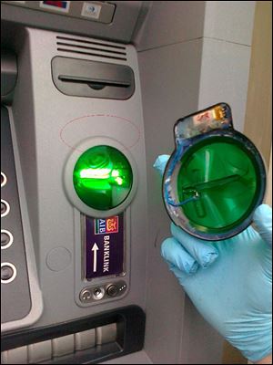 Some anti-skimming devices are blue or green semitransparent plastic casings that protrude from the card acceptance slots. 