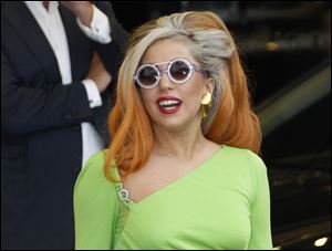 Lady Gaga arrives at the Sungshan airport in Taipei, Taiwan. Lady Gaga has been struck on the head by a pole while performing during the third of three shows in Auckland.