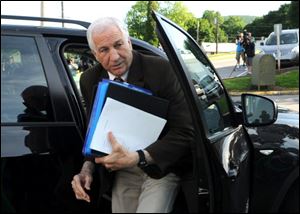 Former Penn State assistant football coach Jerry Sandusky shown arriving at court this week for his trial at the Centre County Courthouse in Bellefonte, Pa. 