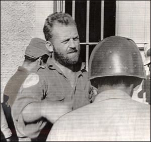 William Morgan is buried in Havana. His widow seeks to bring his body back to Toledo.