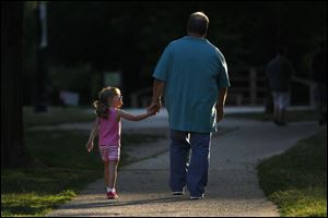 Kirk Baird and his daughter, Lainie spend time together at Wildwood Preserve Metropark.
