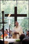  The Rev. Jim Bacik celebrates Mass at Corpus Christi University Parish. The 75-year-old priest is to say his final Masses there June 24. 