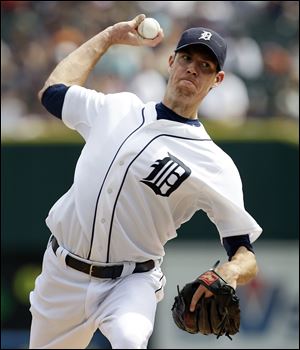 Tigers pitcher Doug Fister threw six scoreless innings while striking out six Rockies batters. He gave up three hits and one walk in the win.