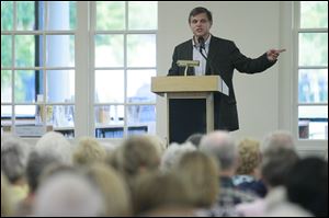 Perrysburg native and internationally known author Douglas Brinkley speaks at Way Public Library.
