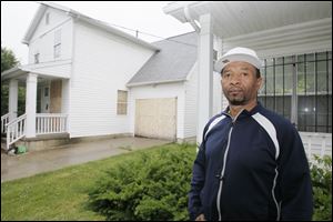 Johnnie Barringer, who lives next to a boarded-up ONYX house on Tecumseh Street, says the blight has contributed to crime in the area. He has installed a security system and bars on his doors and windows.