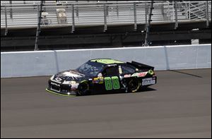 Dale Earnhardt, Jr., takes a practice lap at Michigan International Speedway last week before the running June 17 of the  Quicken Loans 400. Several drivers' cars experienced tire blistering during the race.