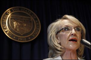 Arizona Gov. Jan Brewer speaks during a news conference about the United States Supreme Court decision regarding Arizona's controversial immigration law.