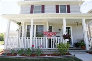 Lisa Conner at her home in Toledo. Ms. Conner lives in tax credit housing developed by United North Community Development Corporation.