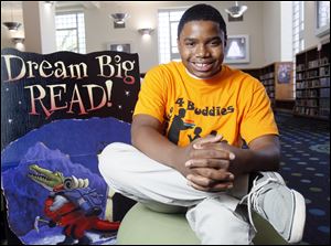 Toure McCord, 14, hopes to collect and distribute 1,000 donated books this summer to disadvantaged children, especially boys, through his Books 4 Buddies effort. Already, 3 33 books have been donated.
