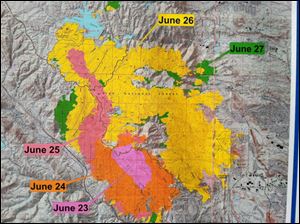 The latest burn perimeter map of the Waldo Canyon wildfire in Colorado Springs, Colo.  The green area is what burned on June 27th, yellow is from June 26th, etc.