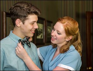 Dylan Passman and Kate Kennedy share a touching moment in the production of Ken Ludwig's 'Fox on the Fairway' at the Huron Playhouse.