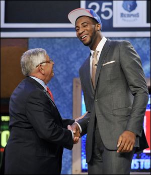 Andre Drummond shakes David Stern's hand after being picked by the Pistons. Detroit hoped he would slide down the draft board.