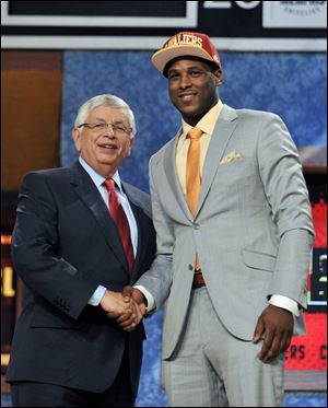 Dion Waiters stands with NBA commissioner David Stern after being picked by the Cavaliers with the fourth pick of Thursday's draft.