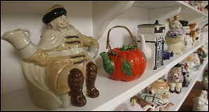 Some of Nancy Kelly's teapots.