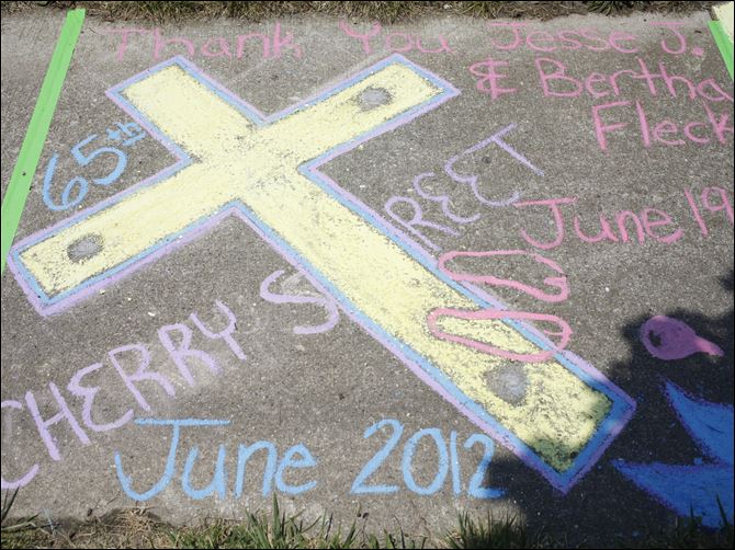 Celebrating with chalk One of the drawings entered in a sidewalk chalk drawing competition during the Cherry Street Mission Ministries 65th anniversary event Saturday in Toledo.