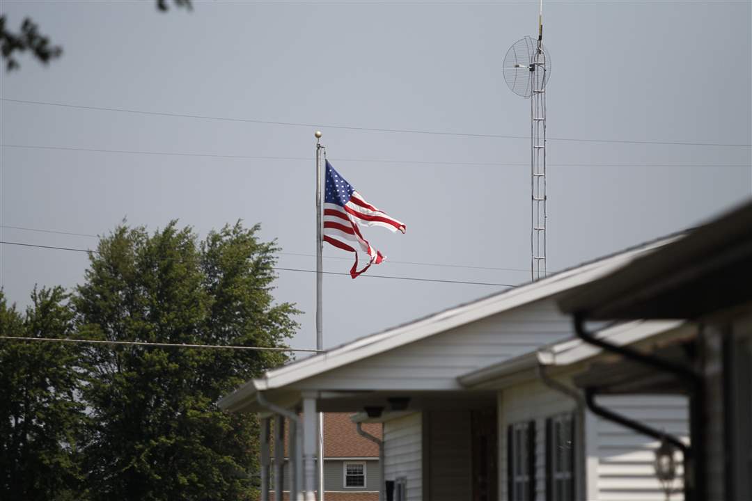 A-damaged-U-S-flag-in-Benton-Ridge-Ohio