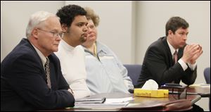 Tyler Kimble, 17, second from left, appears at his hearing on being certified as an adult for sex crimes. He is one of two youths so designated in the last six years.