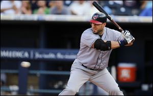 Columbus designated hitter Travis Hafner bats against the Mud Hens in Monday night's game at Fifth Third Field. Hafner was 0-for-4, but he feels he could be close to returning to Cleveland after rehabbing his knee with the Clippers.