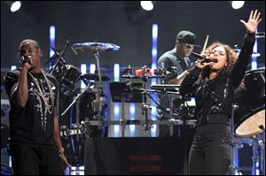 Rapper Jay-Z and singer Alicia Keys perform onstage at the iHeartRadio Music Festival held at the MGM Grand Garden Arena on Sept., 2011.