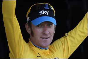 Bradley Wiggins kept the Tour de France lead. He's hoping to be the first Briton to capture the cycling event.