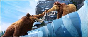 Manny voiced by Ray Romano, left, and Ellie, voiced by Queen Latifah in a scene from ‘Ice Age: Continental Drift.’