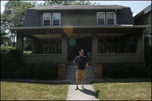 Martin Hunter’s Harvard Boulevard home’s value fell $25,000, according to the Lucas County Auditor’s proposed figures. He said his reaction was shock and horror.
