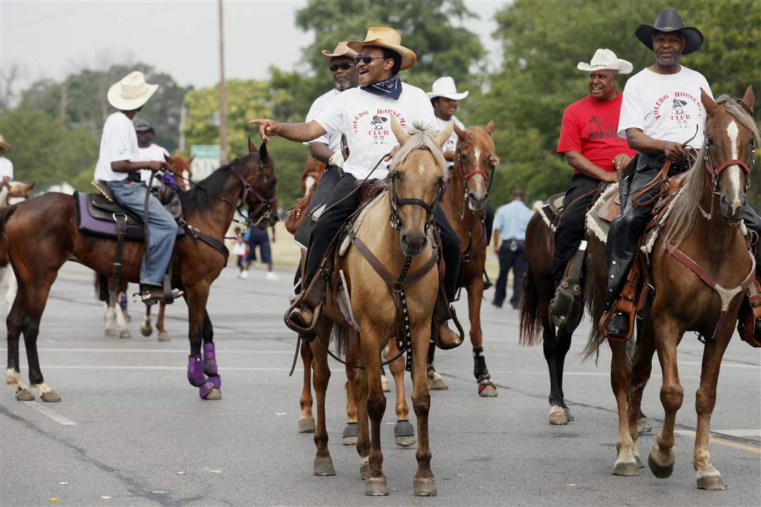 The-Toledo-Horsemen-Club-rides-during-a-parade