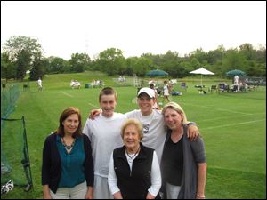 Carol Bently of Perryburg, front, with her daughter, left, Pam Bently Thorne of Manchester by the Sea, Mass., grandson Grant MacPherson with his mom Kate Bentley MacPherson of Perrysburg, and Kevin Brown from St. John's High School.
