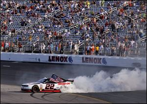 Brad Keselowski does a burnout after winning the NASCAR Nationwide Series auto race at New Hampshire Motor Speedway, Saturday.