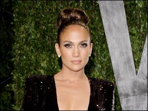 Jennifer Lopez arrives at the Vanity Fair Oscar party in West Hollywood, Calif.