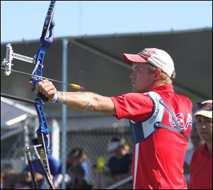 Still focused, Jacob Wukie of Oak Harbor watches the arrow as it leaves his bow headed for a target down range. Wukie has qualified for a third spot on the nation's Olympic archery team.