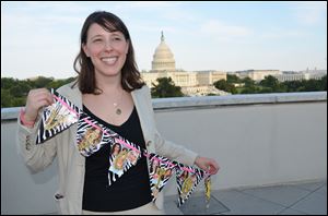 Holly Merbaum holding her sash after winning a celebrity fantasy draft for the ‘Celebrity Wonks & Wonkettes’ league in Washington. 