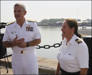 Accompanied by Mary Dalby, owner/operator of the cruise vessel Sandpiper, Rear Adm. Gregory Nosal tours docks and facilities to be used when a flotilla of five vessels calls on Toledo Aug. 23-26 for tours and special commemorative events.