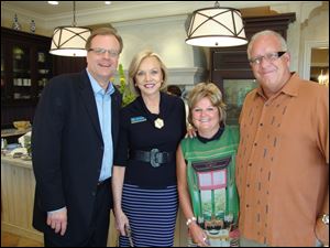 From left, Dan Saevig, Marianne Ballas, and Jole and Jim Harmon at the social gathering for Women & Philanthropy held recently at the home of the Harmons.