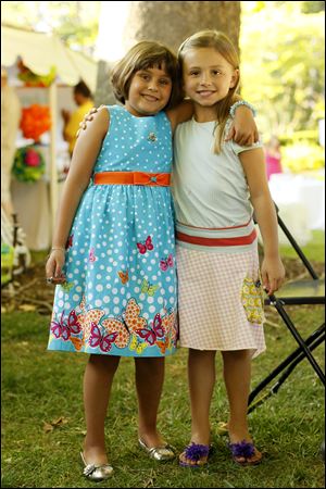 Young chicks Cecilia Chowdhary, left, and Sloan DeWood, both 5, support the cause.