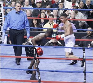 Martin Tucker, white shorts, from Toledo fights Devaris Crayton at the Huntington Center. 