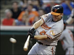 The Orioles' Jim Thome hits a two-run home run off Indians starting pitcher Zach McAllister in the seventh inning on Saturday.