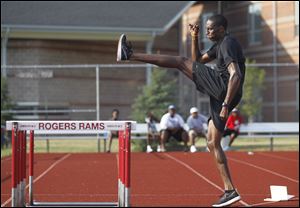 Erik Kynard trains earlier this month at Rogers High School where he became a two-time state champion high jumper. He finished in the top three at the U.S. Olympic trials to go to the Games.