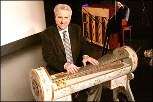 Musician Dennis James with his glass armonica.