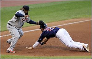 Detroit first baseman Prince Fielder tags out Cleveland runner  Michael Brantley in the fourth inning.