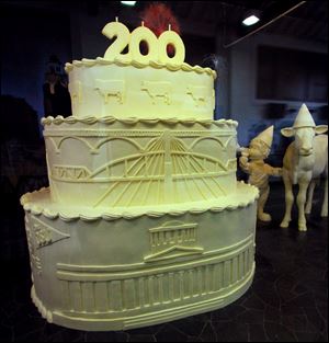 Visitors who attend the 2012 Ohio State Fair can check out a 6-foot-high and 5-foot-wide cake made from 2,400 sticks of butter as dairy officials celebrate the city of Columbus' 200th birthday.
