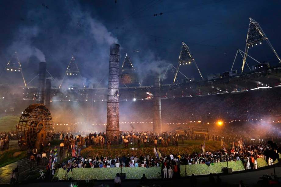 Actors-scale-chimneys-during-a-performance-at-the-Opening-Ceremony